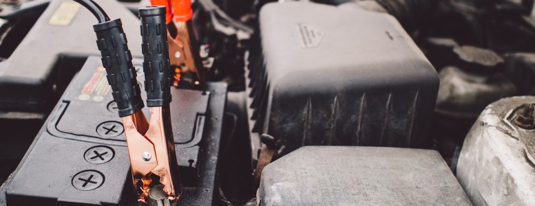 Car battery with jumper cables