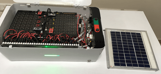 Picture of the first Solarbox prototype which runs on used Laptop and Smartphone batteries and is an IoT Device