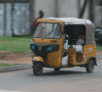 Auto-rickshaw in Abuja photo by ProfessorTim Green