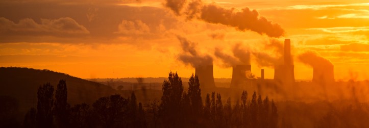 Pollution from a power plant in the dusk